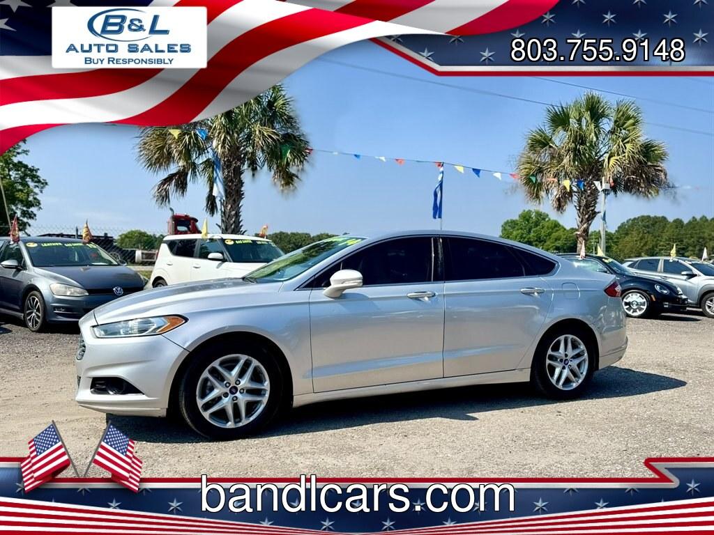 2014 Silver /Tan Ford Fusion (3FA6P0HDXER) with an 1.5l I-4 DI Dohc Ecoboost engine, Automatic transmission, located at 745 East Steele Rd., West Columbia, SC, 29170, (803) 755-9148, 33.927212, -81.148483- Photo#0