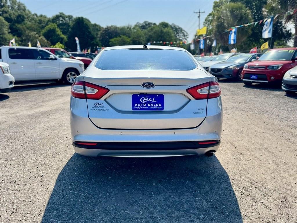 2014 Silver /Tan Ford Fusion (3FA6P0HDXER) with an 1.5l I-4 DI Dohc Ecoboost engine, Automatic transmission, located at 745 East Steele Rd., West Columbia, SC, 29170, (803) 755-9148, 33.927212, -81.148483- Photo#4