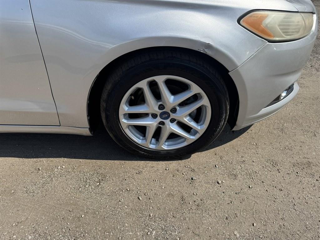 2014 Silver /Tan Ford Fusion (3FA6P0HDXER) with an 1.5l I-4 DI Dohc Ecoboost engine, Automatic transmission, located at 745 East Steele Rd., West Columbia, SC, 29170, (803) 755-9148, 33.927212, -81.148483- Photo#27