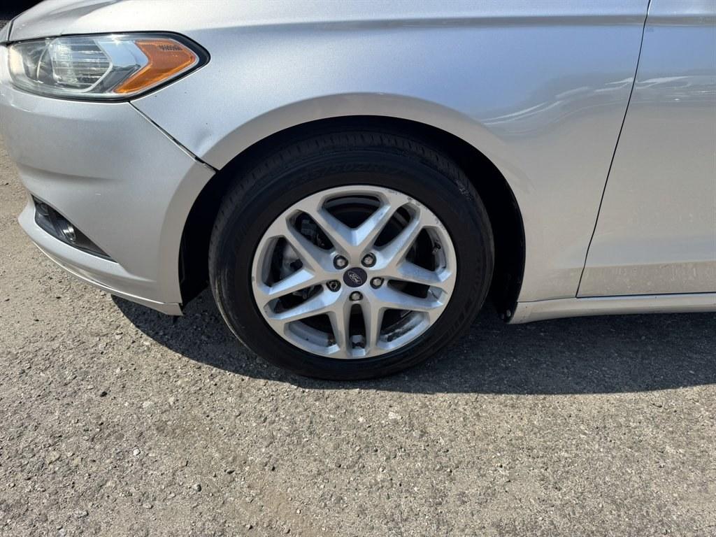 2014 Silver /Tan Ford Fusion (3FA6P0HDXER) with an 1.5l I-4 DI Dohc Ecoboost engine, Automatic transmission, located at 745 East Steele Rd., West Columbia, SC, 29170, (803) 755-9148, 33.927212, -81.148483- Photo#30