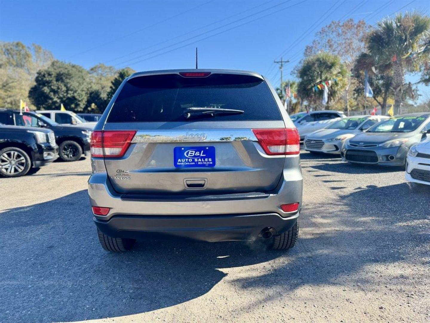 2012 Grey /Grey Jeep Grand Cherokee (1C4RJEAGXCC) with an 3.6l V6 MPI Dohc VVT Flex engine, Automatic transmission, located at 745 East Steele Rd., West Columbia, SC, 29170, (803) 755-9148, 33.927212, -81.148483 - Special Internet Price! 2012 Jeep Grand Cherokee - Photo#4