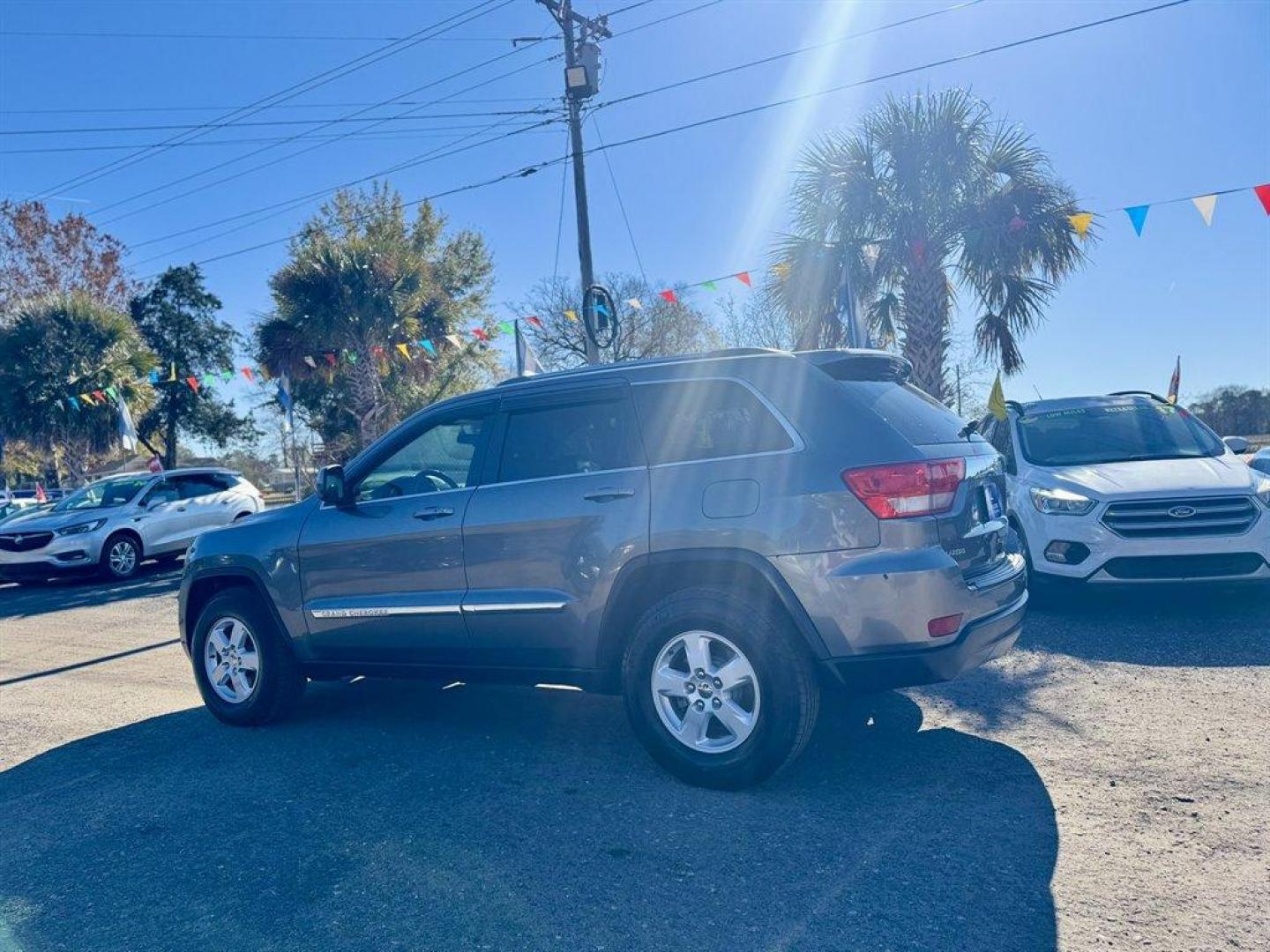 2012 Grey /Grey Jeep Grand Cherokee (1C4RJEAGXCC) with an 3.6l V6 MPI Dohc VVT Flex engine, Automatic transmission, located at 745 East Steele Rd., West Columbia, SC, 29170, (803) 755-9148, 33.927212, -81.148483 - Special Internet Price! 2012 Jeep Grand Cherokee - Photo#5