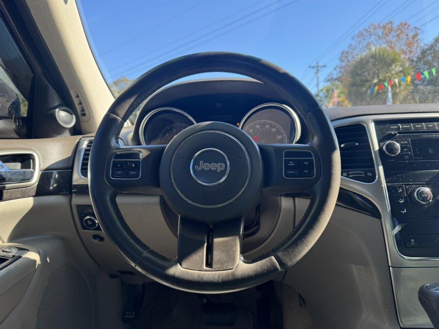 2012 Grey /Grey Jeep Grand Cherokee (1C4RJEAGXCC) with an 3.6l V6 MPI Dohc VVT Flex engine, Automatic transmission, located at 745 East Steele Rd., West Columbia, SC, 29170, (803) 755-9148, 33.927212, -81.148483 - Special Internet Price! 2012 Jeep Grand Cherokee - Photo#7