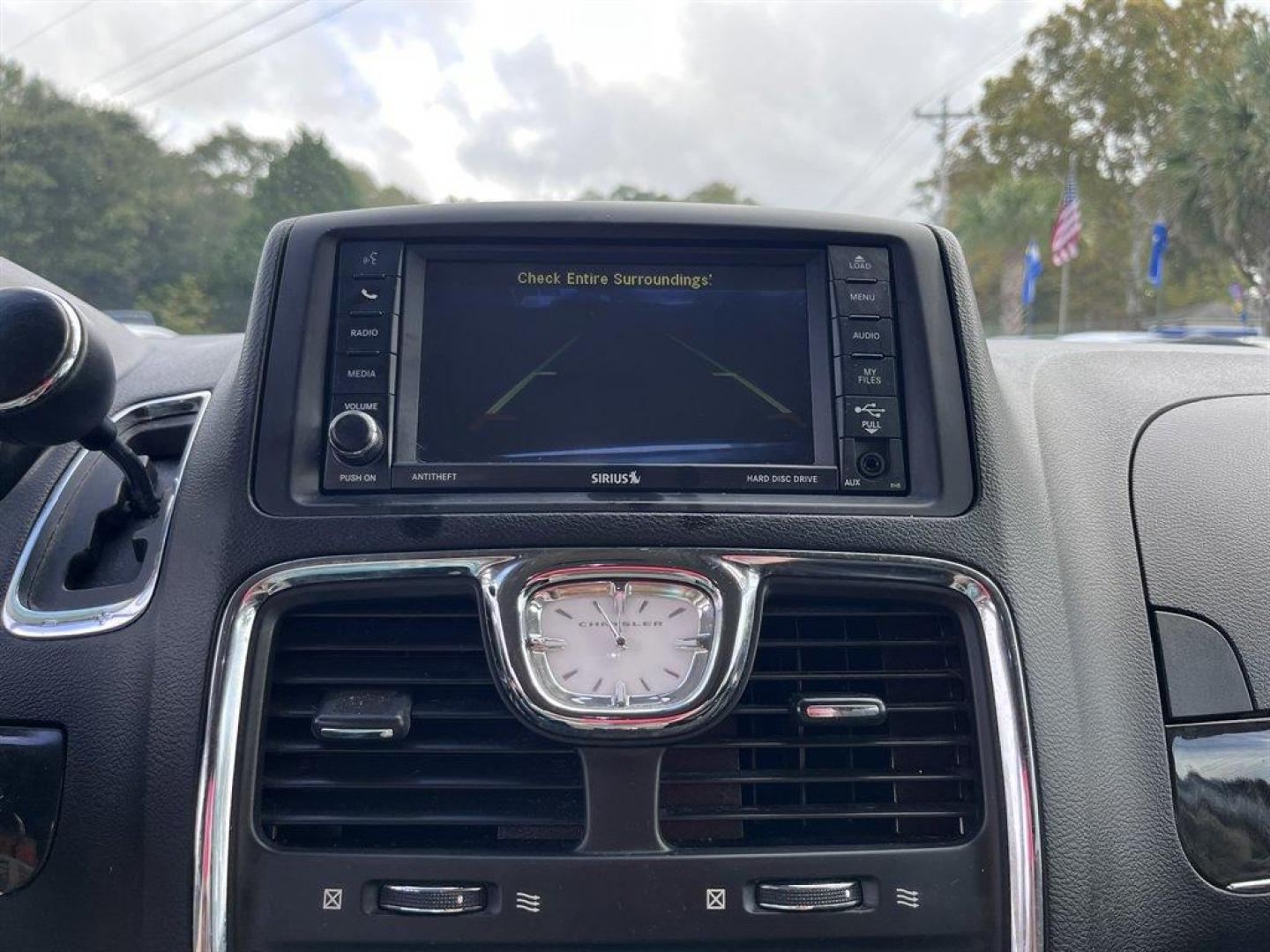 2013 Silver /Black Chrysler Town and Country (2C4RC1BG8DR) with an 3.6l V6 MPI Dohc VVT Flex engine, Automatic transmission, located at 745 East Steele Rd., West Columbia, SC, 29170, (803) 755-9148, 33.927212, -81.148483 - Special Internet Price! 2013 Chrysler Town and Country with AM/FM stereo, Backup camera, Uconnect, Automatic air conditioning, Cruise control, Leather interior, 2nd row overhead 9 VGA video screen, 3rd row 60/40 fold-in-floor bench seat, 2nd row Stow N' Go buckets, Power sliding rear doors, Powered - Photo#16