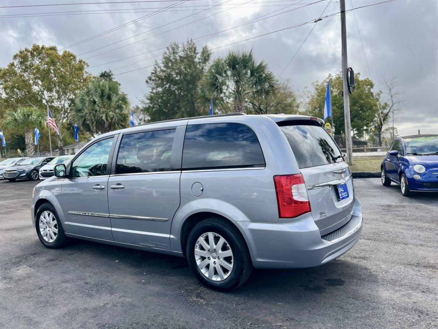 2013 Silver /Black Chrysler Town and Country (2C4RC1BG8DR) with an 3.6l V6 MPI Dohc VVT Flex engine, Automatic transmission, located at 745 East Steele Rd., West Columbia, SC, 29170, (803) 755-9148, 33.927212, -81.148483 - Special Internet Price! 2013 Chrysler Town and Country with AM/FM stereo, Backup camera, Uconnect, Automatic air conditioning, Cruise control, Leather interior, 2nd row overhead 9 VGA video screen, 3rd row 60/40 fold-in-floor bench seat, 2nd row Stow N' Go buckets, Power sliding rear doors, Powered - Photo#2