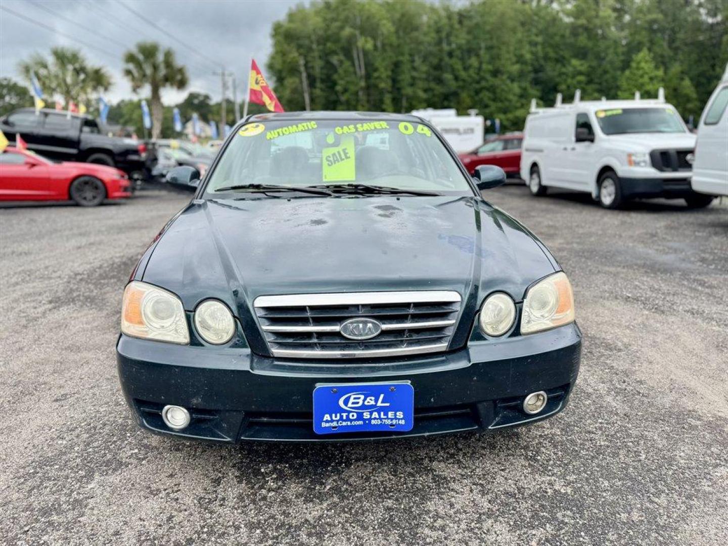 2004 Black /Grey Kia Optima (KNAGD126045) with an 2.4l I-4 MPI Dohc 2.4l engine, Automatic transmission, located at 745 East Steele Rd., West Columbia, SC, 29170, (803) 755-9148, 33.927212, -81.148483 - Special Internet Price! 2004 Kia Optima with AM/FM radio, Cruise control, Sunroof, Cloth interior, Powered windows, Powered door locks, Plus more! - Photo#1