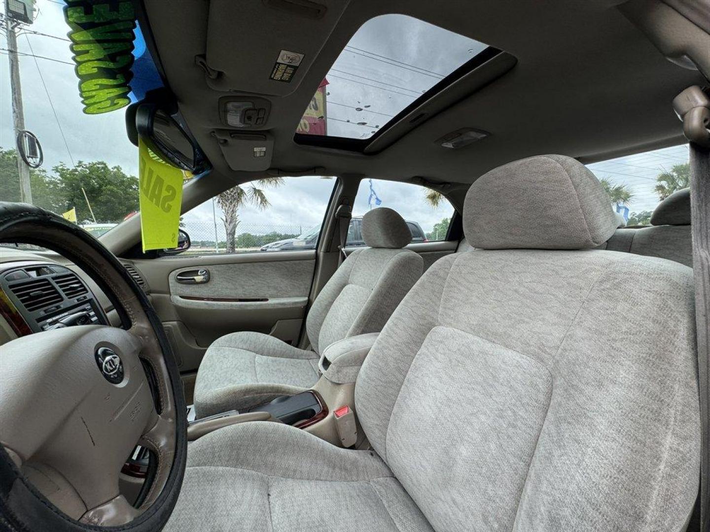 2004 Black /Grey Kia Optima (KNAGD126045) with an 2.4l I-4 MPI Dohc 2.4l engine, Automatic transmission, located at 745 East Steele Rd., West Columbia, SC, 29170, (803) 755-9148, 33.927212, -81.148483 - Special Internet Price! 2004 Kia Optima with AM/FM radio, Cruise control, Sunroof, Cloth interior, Powered windows, Powered door locks, Plus more! - Photo#22