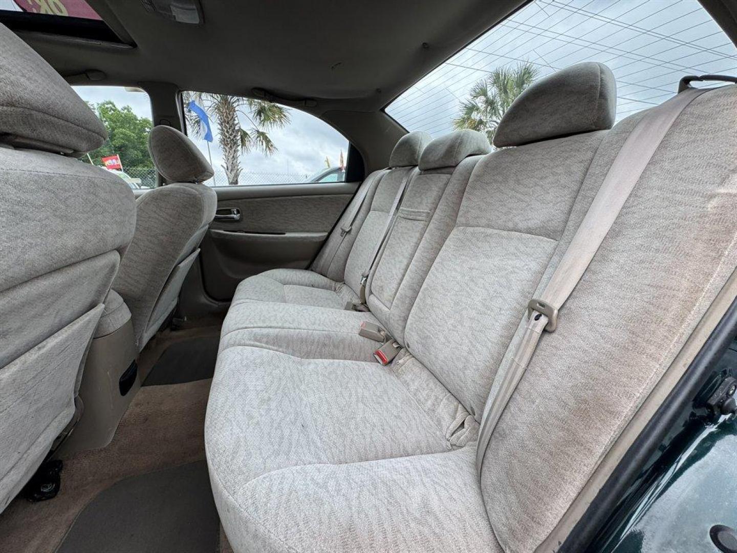 2004 Black /Grey Kia Optima (KNAGD126045) with an 2.4l I-4 MPI Dohc 2.4l engine, Automatic transmission, located at 745 East Steele Rd., West Columbia, SC, 29170, (803) 755-9148, 33.927212, -81.148483 - Special Internet Price! 2004 Kia Optima with AM/FM radio, Cruise control, Sunroof, Cloth interior, Powered windows, Powered door locks, Plus more! - Photo#24