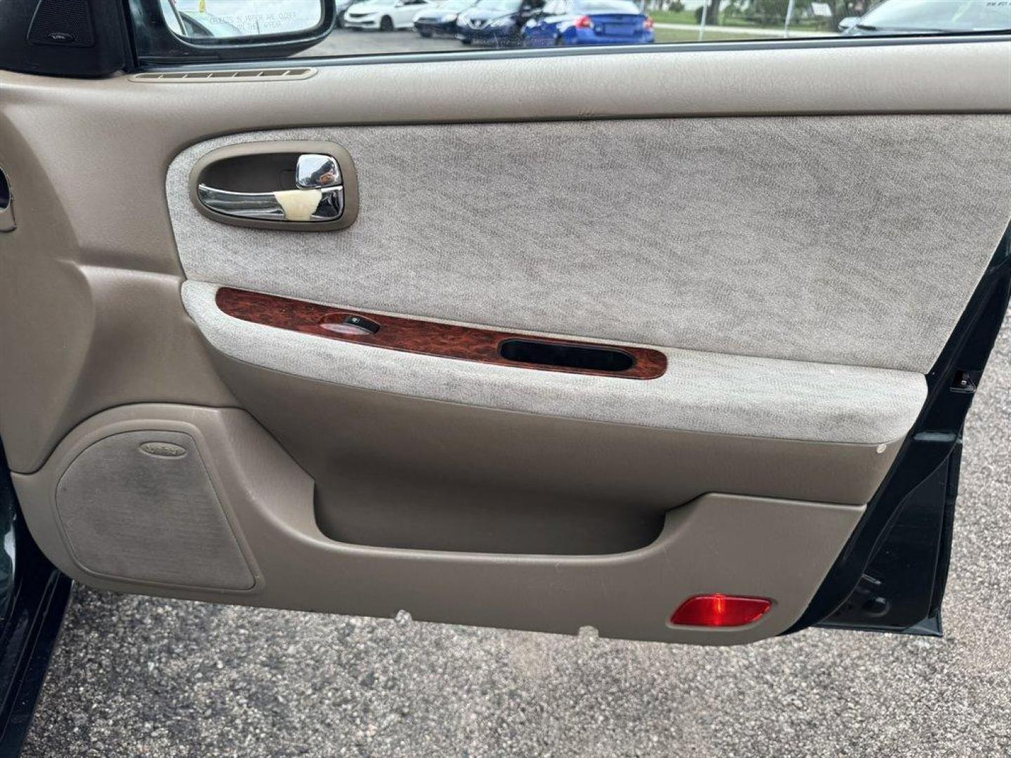 2004 Black /Grey Kia Optima (KNAGD126045) with an 2.4l I-4 MPI Dohc 2.4l engine, Automatic transmission, located at 745 East Steele Rd., West Columbia, SC, 29170, (803) 755-9148, 33.927212, -81.148483 - Special Internet Price! 2004 Kia Optima with AM/FM radio, Cruise control, Sunroof, Cloth interior, Powered windows, Powered door locks, Plus more! - Photo#27