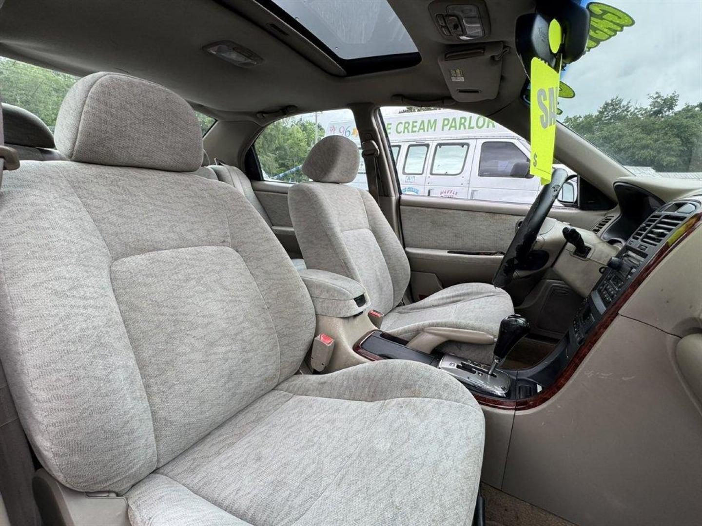 2004 Black /Grey Kia Optima (KNAGD126045) with an 2.4l I-4 MPI Dohc 2.4l engine, Automatic transmission, located at 745 East Steele Rd., West Columbia, SC, 29170, (803) 755-9148, 33.927212, -81.148483 - Special Internet Price! 2004 Kia Optima with AM/FM radio, Cruise control, Sunroof, Cloth interior, Powered windows, Powered door locks, Plus more! - Photo#28