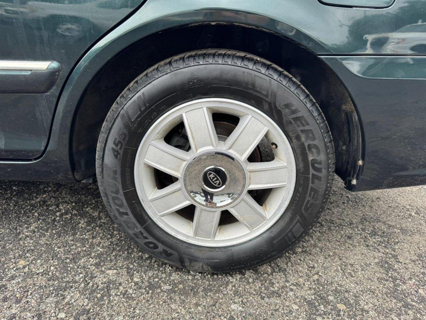 2004 Black /Grey Kia Optima (KNAGD126045) with an 2.4l I-4 MPI Dohc 2.4l engine, Automatic transmission, located at 745 East Steele Rd., West Columbia, SC, 29170, (803) 755-9148, 33.927212, -81.148483 - Special Internet Price! 2004 Kia Optima with AM/FM radio, Cruise control, Sunroof, Cloth interior, Powered windows, Powered door locks, Plus more! - Photo#32