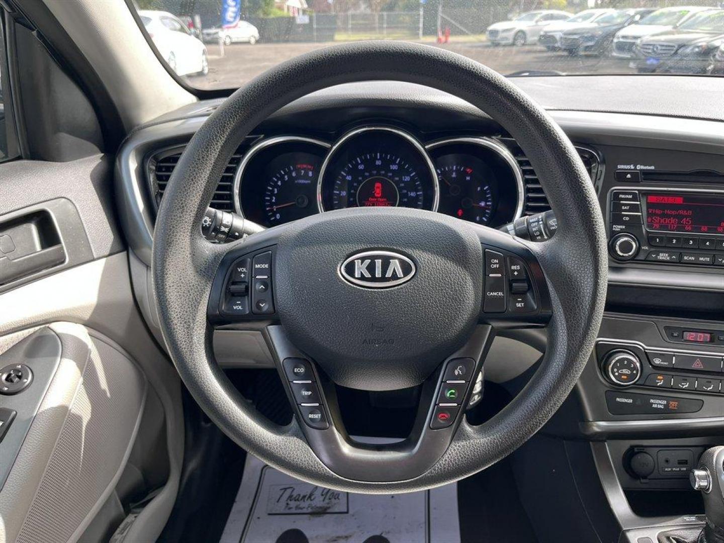 2012 Black /Grey Kia Optima (5XXGM4A79CG) with an 2.4l I-4 DI Dohc 2.4l engine, Automatic transmission, located at 745 East Steele Rd., West Columbia, SC, 29170, (803) 755-9148, 33.927212, -81.148483 - Special Internet Price! 2012 Kia Optima with AM/FM stereo, Bluetooth hands-free calling, Cruise control, Manual air conditioning, Keyless entry, Cloth interior, Powered driver seat, Powered windows, Powered door locks, Plus more! - Photo#9