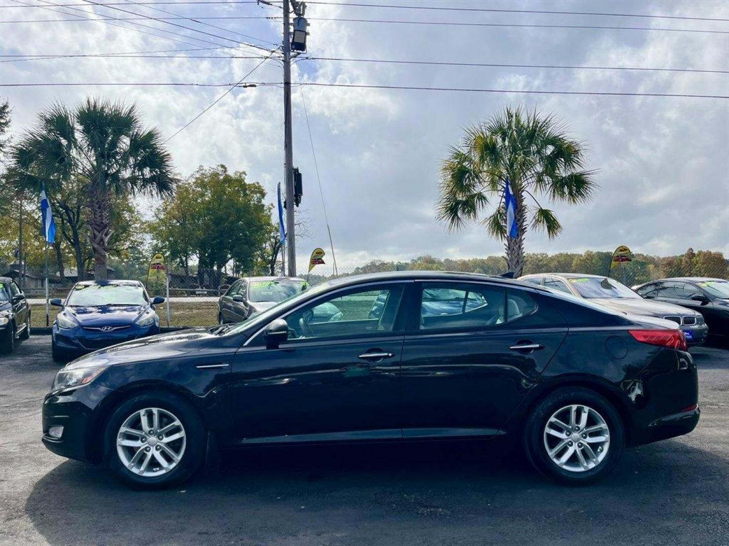 2012 Black /Grey Kia Optima (5XXGM4A79CG) with an 2.4l I-4 DI Dohc 2.4l engine, Automatic transmission, located at 745 East Steele Rd., West Columbia, SC, 29170, (803) 755-9148, 33.927212, -81.148483 - Special Internet Price! 2012 Kia Optima with AM/FM stereo, Bluetooth hands-free calling, Cruise control, Manual air conditioning, Keyless entry, Cloth interior, Powered driver seat, Powered windows, Powered door locks, Plus more! - Photo#1