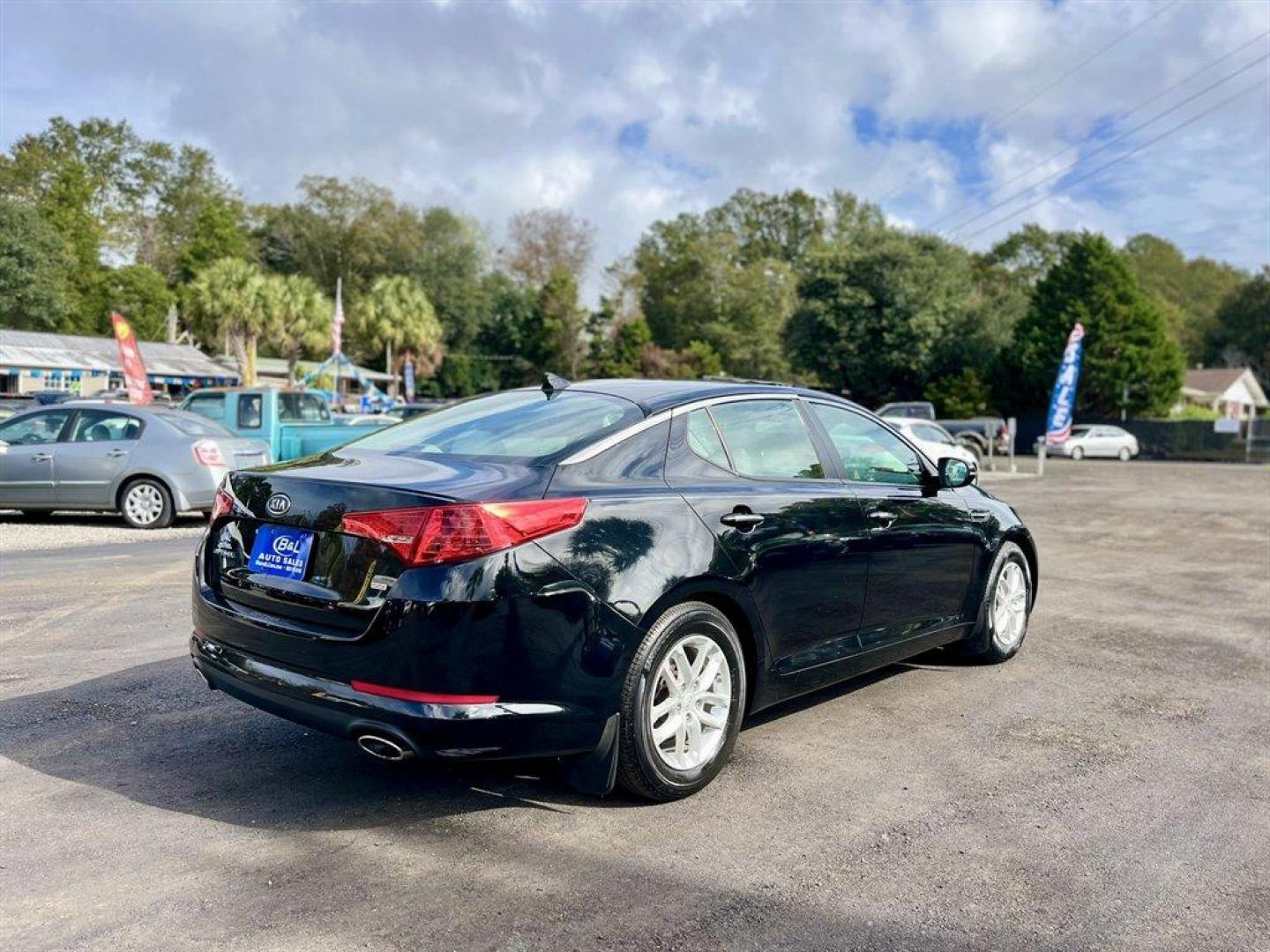 2012 Black /Grey Kia Optima (5XXGM4A79CG) with an 2.4l I-4 DI Dohc 2.4l engine, Automatic transmission, located at 745 East Steele Rd., West Columbia, SC, 29170, (803) 755-9148, 33.927212, -81.148483 - Special Internet Price! 2012 Kia Optima with AM/FM stereo, Bluetooth hands-free calling, Cruise control, Manual air conditioning, Keyless entry, Cloth interior, Powered driver seat, Powered windows, Powered door locks, Plus more! - Photo#4