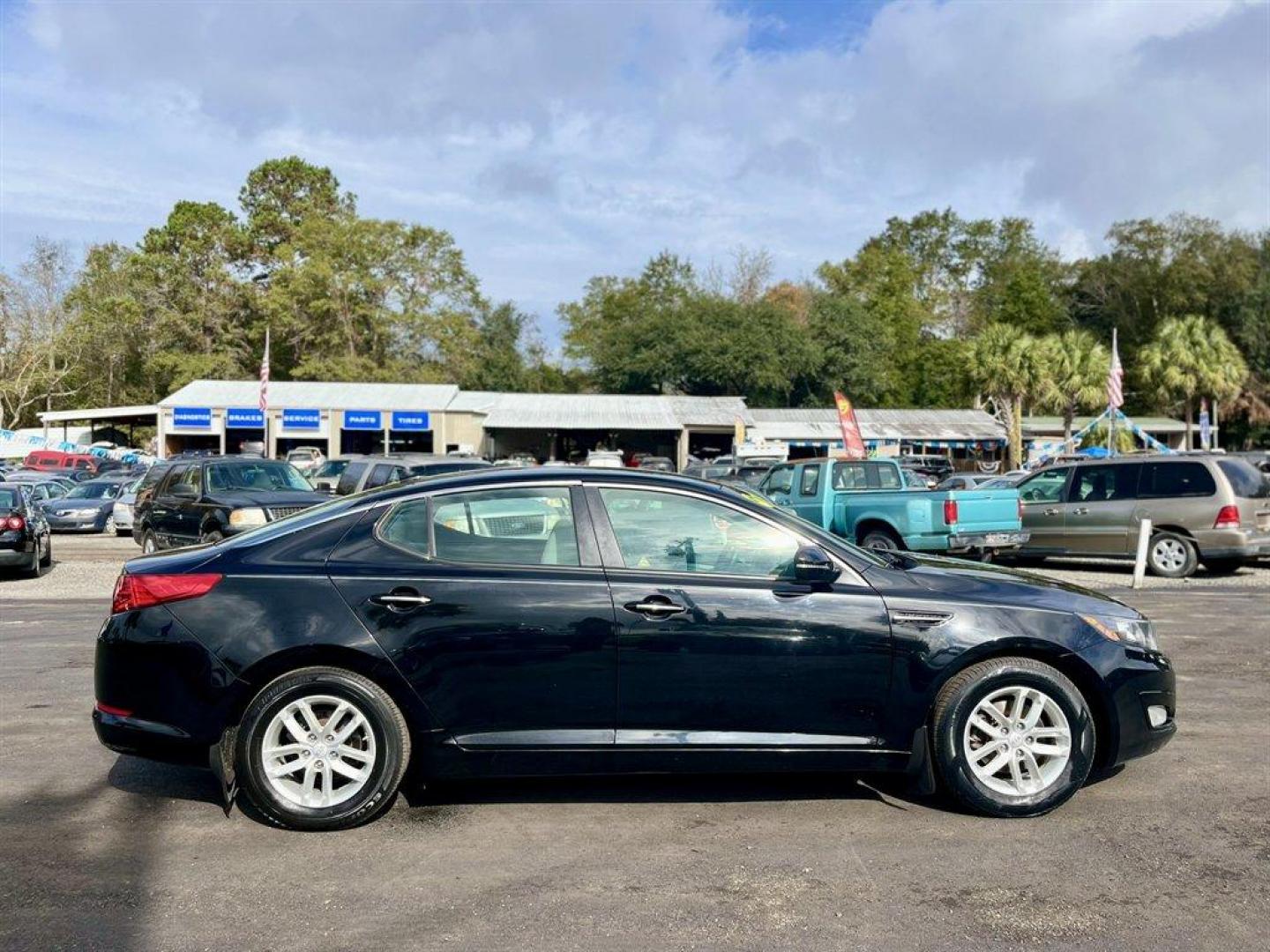 2012 Black /Grey Kia Optima (5XXGM4A79CG) with an 2.4l I-4 DI Dohc 2.4l engine, Automatic transmission, located at 745 East Steele Rd., West Columbia, SC, 29170, (803) 755-9148, 33.927212, -81.148483 - Special Internet Price! 2012 Kia Optima with AM/FM stereo, Bluetooth hands-free calling, Cruise control, Manual air conditioning, Keyless entry, Cloth interior, Powered driver seat, Powered windows, Powered door locks, Plus more! - Photo#5