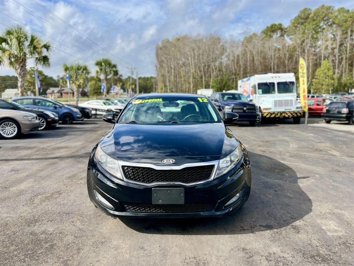 2012 Black /Grey Kia Optima (5XXGM4A79CG) with an 2.4l I-4 DI Dohc 2.4l engine, Automatic transmission, located at 745 East Steele Rd., West Columbia, SC, 29170, (803) 755-9148, 33.927212, -81.148483 - Special Internet Price! 2012 Kia Optima with AM/FM stereo, Bluetooth hands-free calling, Cruise control, Manual air conditioning, Keyless entry, Cloth interior, Powered driver seat, Powered windows, Powered door locks, Plus more! - Photo#7