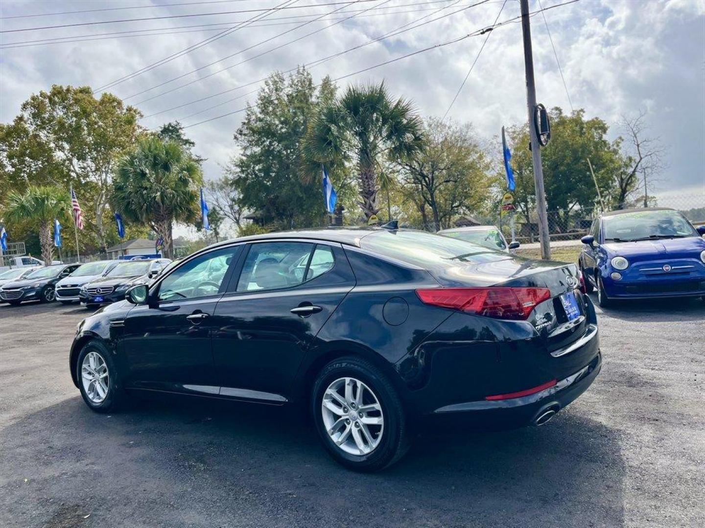 2012 Black /Grey Kia Optima (5XXGM4A79CG) with an 2.4l I-4 DI Dohc 2.4l engine, Automatic transmission, located at 745 East Steele Rd., West Columbia, SC, 29170, (803) 755-9148, 33.927212, -81.148483 - Special Internet Price! 2012 Kia Optima with AM/FM stereo, Bluetooth hands-free calling, Cruise control, Manual air conditioning, Keyless entry, Cloth interior, Powered driver seat, Powered windows, Powered door locks, Plus more! - Photo#2