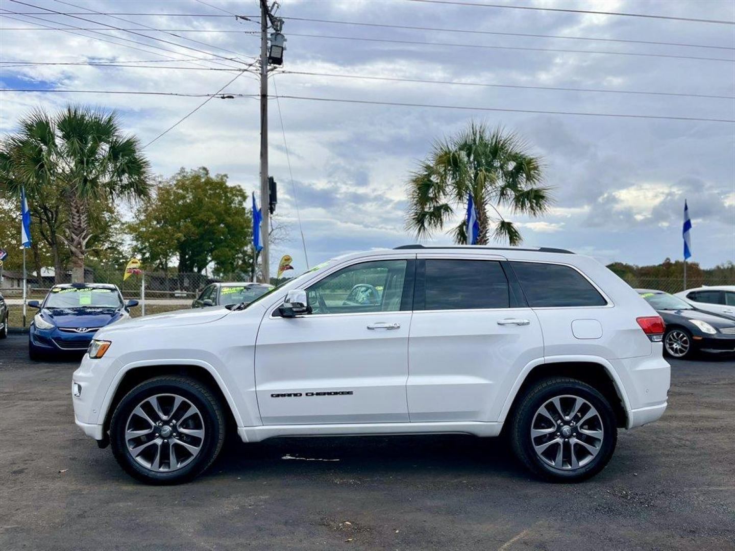 2017 White /Grey Jeep Grand Cherokee (1C4RJFCG1HC) with an 3.6l V6 MPI Dohc VVT Flex engine, Automatic transmission, located at 745 East Steele Rd., West Columbia, SC, 29170, (803) 755-9148, 33.927212, -81.148483 - Special Internet Price! 2017 Jeep Grand Cherokee with AM/FM radio, Backup camera, Navigation, Cruise control, Panoramic sunroof, Leather interior, Powered windows, Powered door locks, Plus more! - Photo#1