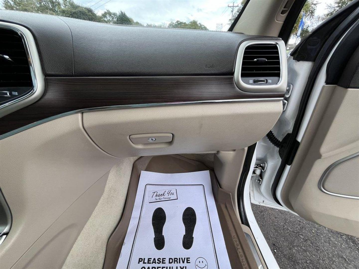 2017 White /Grey Jeep Grand Cherokee (1C4RJFCG1HC) with an 3.6l V6 MPI Dohc VVT Flex engine, Automatic transmission, located at 745 East Steele Rd., West Columbia, SC, 29170, (803) 755-9148, 33.927212, -81.148483 - Special Internet Price! 2017 Jeep Grand Cherokee with AM/FM radio, Backup camera, Navigation, Cruise control, Panoramic sunroof, Leather interior, Powered windows, Powered door locks, Plus more! - Photo#38