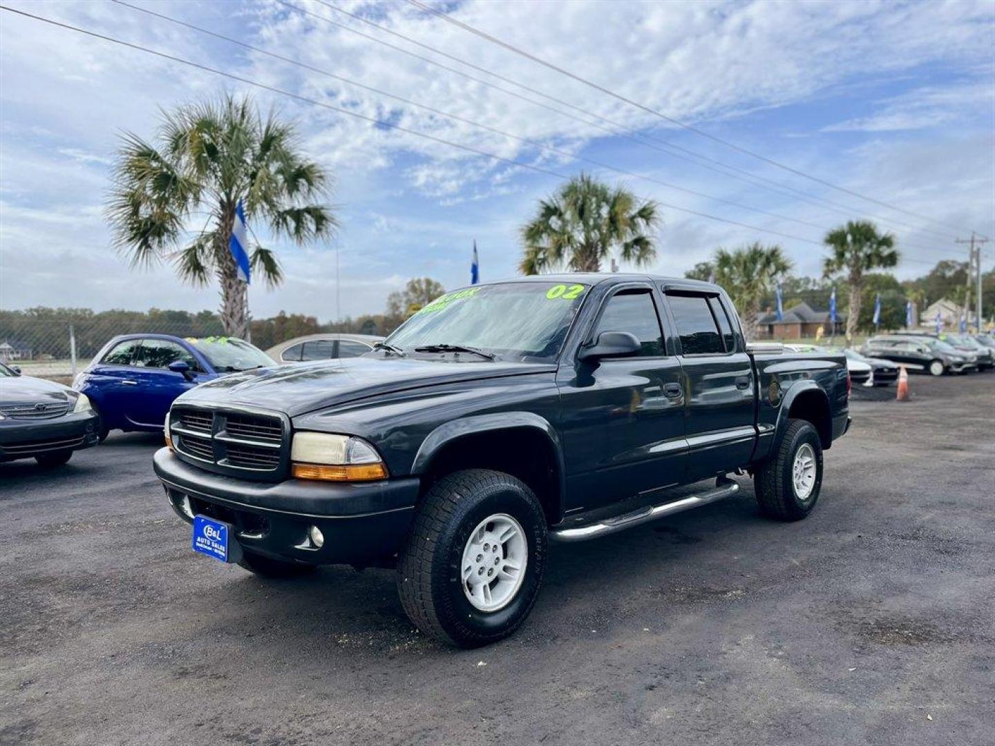 2002 Grey /Grey Dodge Dakota (1B7HG38N92S) with an 4.7l V8 MPI 4.7l engine, Automatic transmission, located at 745 East Steele Rd., West Columbia, SC, 29170, (803) 755-9148, 33.927212, -81.148483 - Special Internet Price! 2002 Dodge Dakota with AM/FM stereo, Cruise control, Manual air conditioning, Cloth interior, Front 40/20/40 split bench, Powered windows, Powered door locks, Plus more! - Photo#0