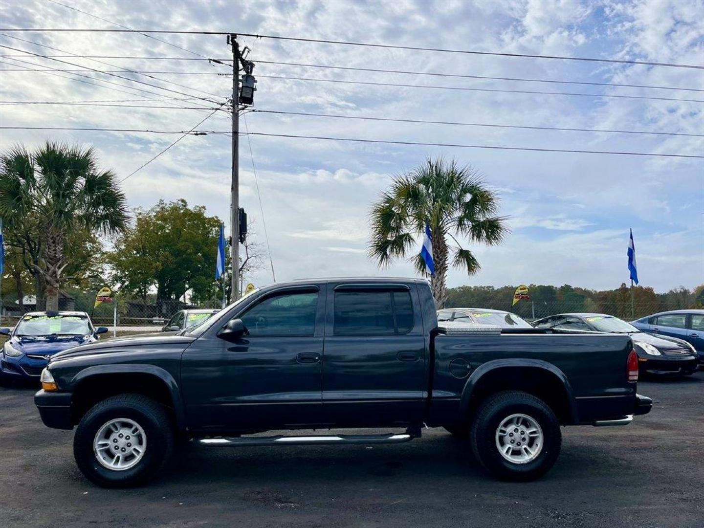 2002 Grey /Grey Dodge Dakota (1B7HG38N92S) with an 4.7l V8 MPI 4.7l engine, Automatic transmission, located at 745 East Steele Rd., West Columbia, SC, 29170, (803) 755-9148, 33.927212, -81.148483 - Special Internet Price! 2002 Dodge Dakota with AM/FM stereo, Cruise control, Manual air conditioning, Cloth interior, Front 40/20/40 split bench, Powered windows, Powered door locks, Plus more! - Photo#1