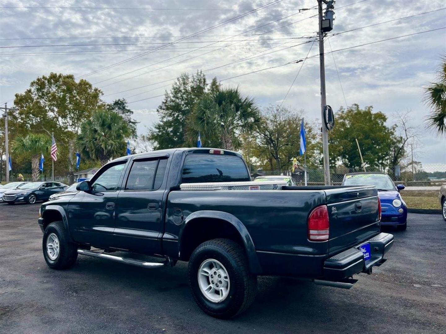 2002 Grey /Grey Dodge Dakota (1B7HG38N92S) with an 4.7l V8 MPI 4.7l engine, Automatic transmission, located at 745 East Steele Rd., West Columbia, SC, 29170, (803) 755-9148, 33.927212, -81.148483 - Special Internet Price! 2002 Dodge Dakota with AM/FM stereo, Cruise control, Manual air conditioning, Cloth interior, Front 40/20/40 split bench, Powered windows, Powered door locks, Plus more! - Photo#2