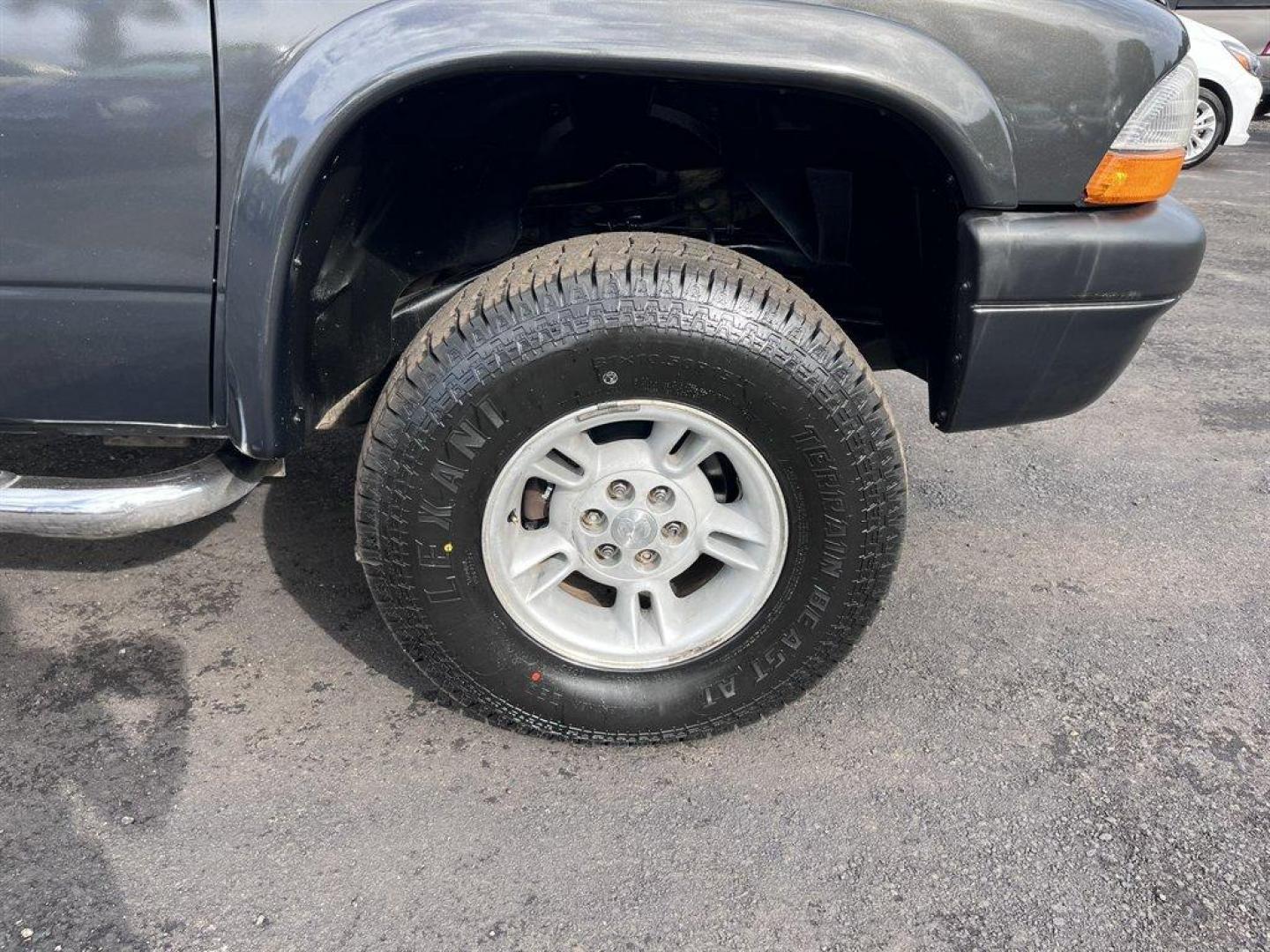 2002 Grey /Grey Dodge Dakota (1B7HG38N92S) with an 4.7l V8 MPI 4.7l engine, Automatic transmission, located at 745 East Steele Rd., West Columbia, SC, 29170, (803) 755-9148, 33.927212, -81.148483 - Special Internet Price! 2002 Dodge Dakota with AM/FM stereo, Cruise control, Manual air conditioning, Cloth interior, Front 40/20/40 split bench, Powered windows, Powered door locks, Plus more! - Photo#32