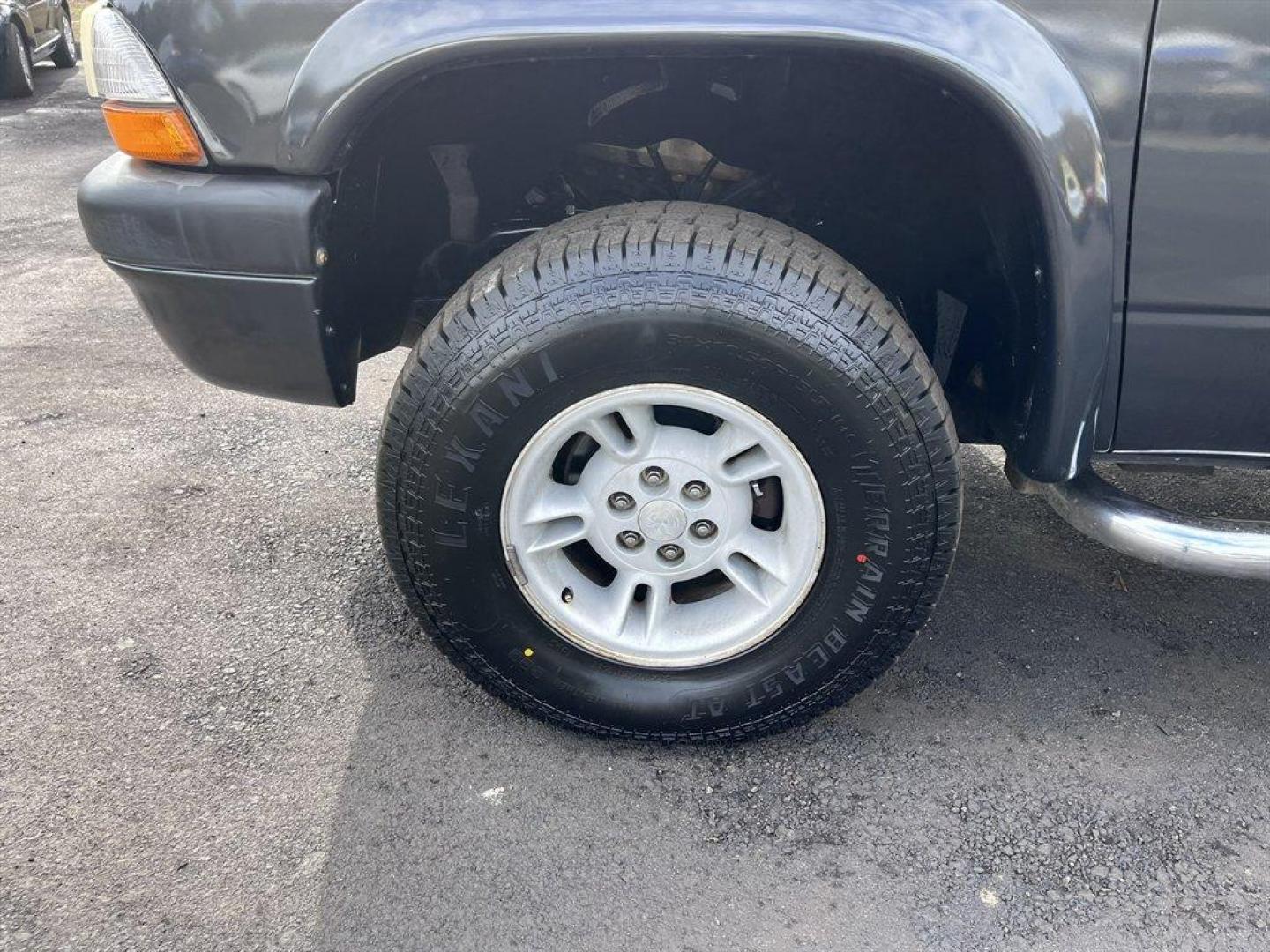 2002 Grey /Grey Dodge Dakota (1B7HG38N92S) with an 4.7l V8 MPI 4.7l engine, Automatic transmission, located at 745 East Steele Rd., West Columbia, SC, 29170, (803) 755-9148, 33.927212, -81.148483 - Special Internet Price! 2002 Dodge Dakota with AM/FM stereo, Cruise control, Manual air conditioning, Cloth interior, Front 40/20/40 split bench, Powered windows, Powered door locks, Plus more! - Photo#35