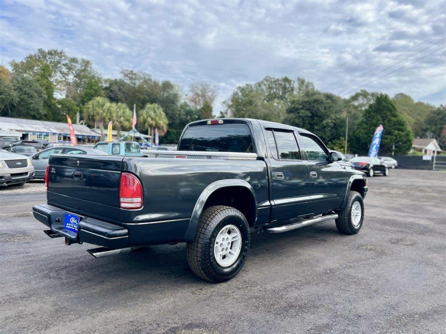 2002 Grey /Grey Dodge Dakota (1B7HG38N92S) with an 4.7l V8 MPI 4.7l engine, Automatic transmission, located at 745 East Steele Rd., West Columbia, SC, 29170, (803) 755-9148, 33.927212, -81.148483 - Special Internet Price! 2002 Dodge Dakota with AM/FM stereo, Cruise control, Manual air conditioning, Cloth interior, Front 40/20/40 split bench, Powered windows, Powered door locks, Plus more! - Photo#4