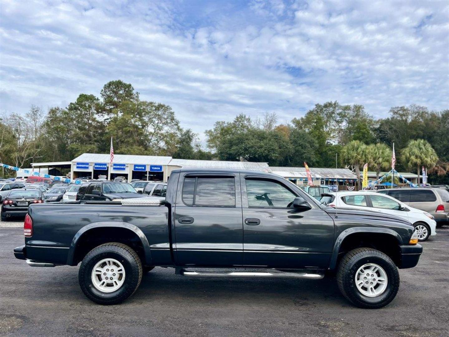 2002 Grey /Grey Dodge Dakota (1B7HG38N92S) with an 4.7l V8 MPI 4.7l engine, Automatic transmission, located at 745 East Steele Rd., West Columbia, SC, 29170, (803) 755-9148, 33.927212, -81.148483 - Special Internet Price! 2002 Dodge Dakota with AM/FM stereo, Cruise control, Manual air conditioning, Cloth interior, Front 40/20/40 split bench, Powered windows, Powered door locks, Plus more! - Photo#5