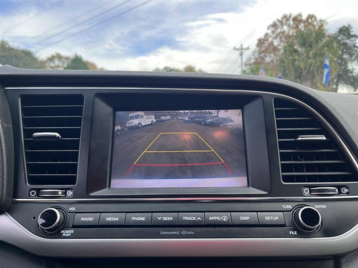 2018 White /Black Hyundai Elantra (5NPD84LF4JH) with an 2.0l I-4 MPI Dohc 2.0l engine, Automatic transmission, located at 745 East Steele Rd., West Columbia, SC, 29170, (803) 755-9148, 33.927212, -81.148483 - Special Internet Price! 2018 Hyundai Elantra with AM/FM radio, Bluetooth, Backup camera, Cruise control, Manual air conditioning, Cloth interior, Keyless entry, Powered windows, Powered door locks, Plus more! - Photo#16