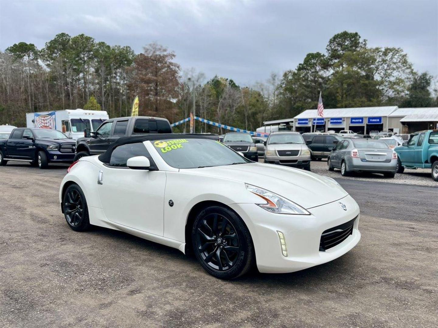 2015 White /Grey Nissan 370z (JN1AZ4FH6FM) with an 3.7l V6 SFI Dohc Cvtcs 3. engine, Automatic transmission, located at 745 East Steele Rd., West Columbia, SC, 29170, (803) 755-9148, 33.927212, -81.148483 - Special Internet Price! 2015 Nissan 370z with convertible top, AM/FM radio, Cruise control, Heated seats, Backup camera, Keyless entry, Powered windows, Powered door locks, Plus more! - Photo#6