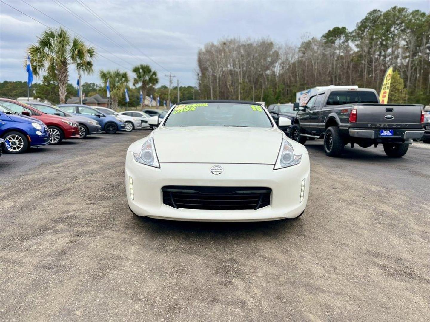 2015 White /Grey Nissan 370z (JN1AZ4FH6FM) with an 3.7l V6 SFI Dohc Cvtcs 3. engine, Automatic transmission, located at 745 East Steele Rd., West Columbia, SC, 29170, (803) 755-9148, 33.927212, -81.148483 - Special Internet Price! 2015 Nissan 370z with convertible top, AM/FM radio, Cruise control, Heated seats, Backup camera, Keyless entry, Powered windows, Powered door locks, Plus more! - Photo#7