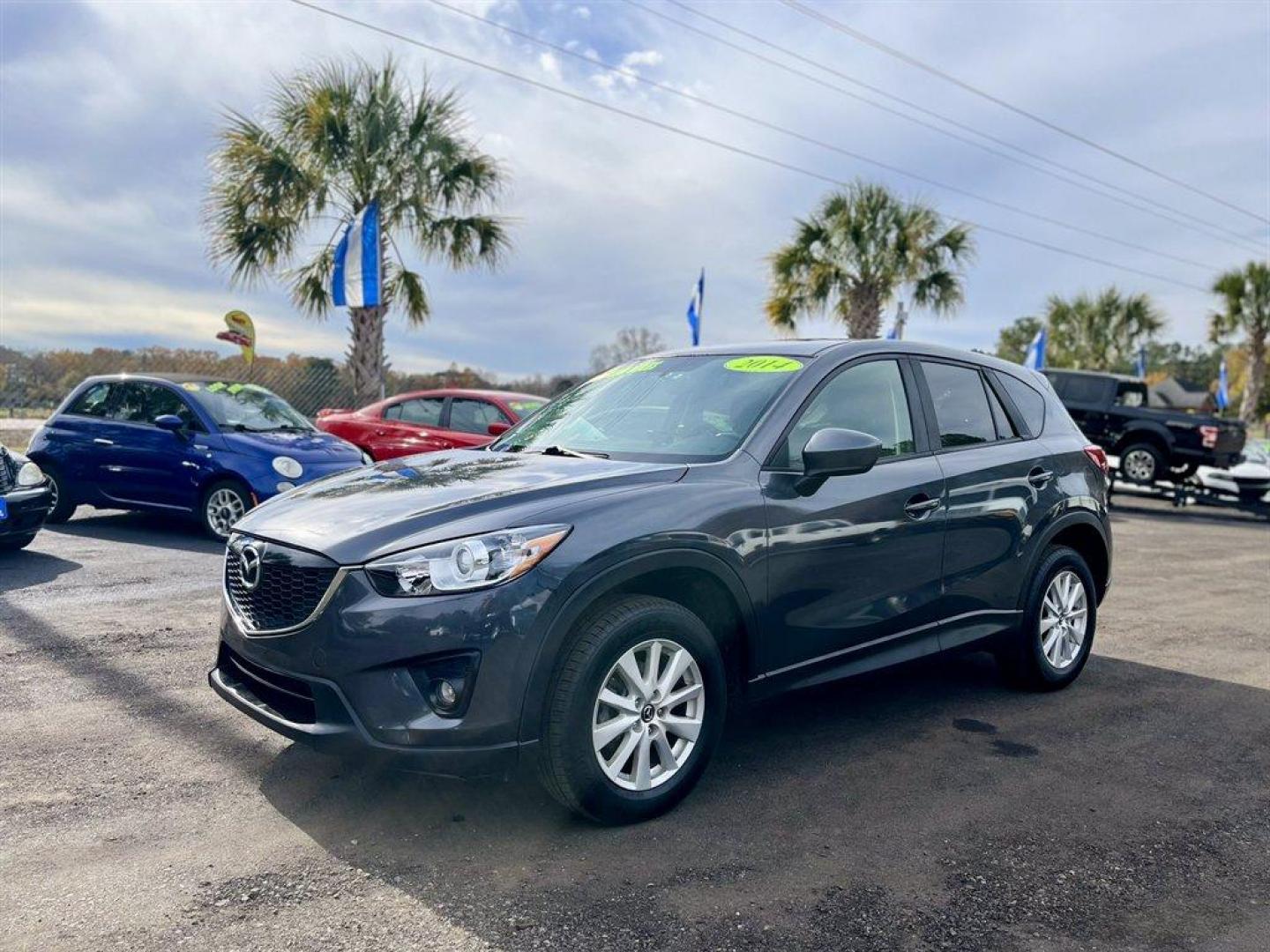 2014 Grey /Black Mazda CX-5 (JM3KE4CY6E0) with an 2.5l I-4 DI Dohc 2.5l engine, Automatic transmission, located at 745 East Steele Rd., West Columbia, SC, 29170, (803) 755-9148, 33.927212, -81.148483 - Special Internet Price! 2014 Mazda CX-5 with AM/FM radio, Bluetooth, Backup camera, Navigation, Sunroof, Manual air conditioning, Cloth interior, Powered driver seat, Keyless entry, Powered door locks, Powered windows, Plus more! - Photo#0