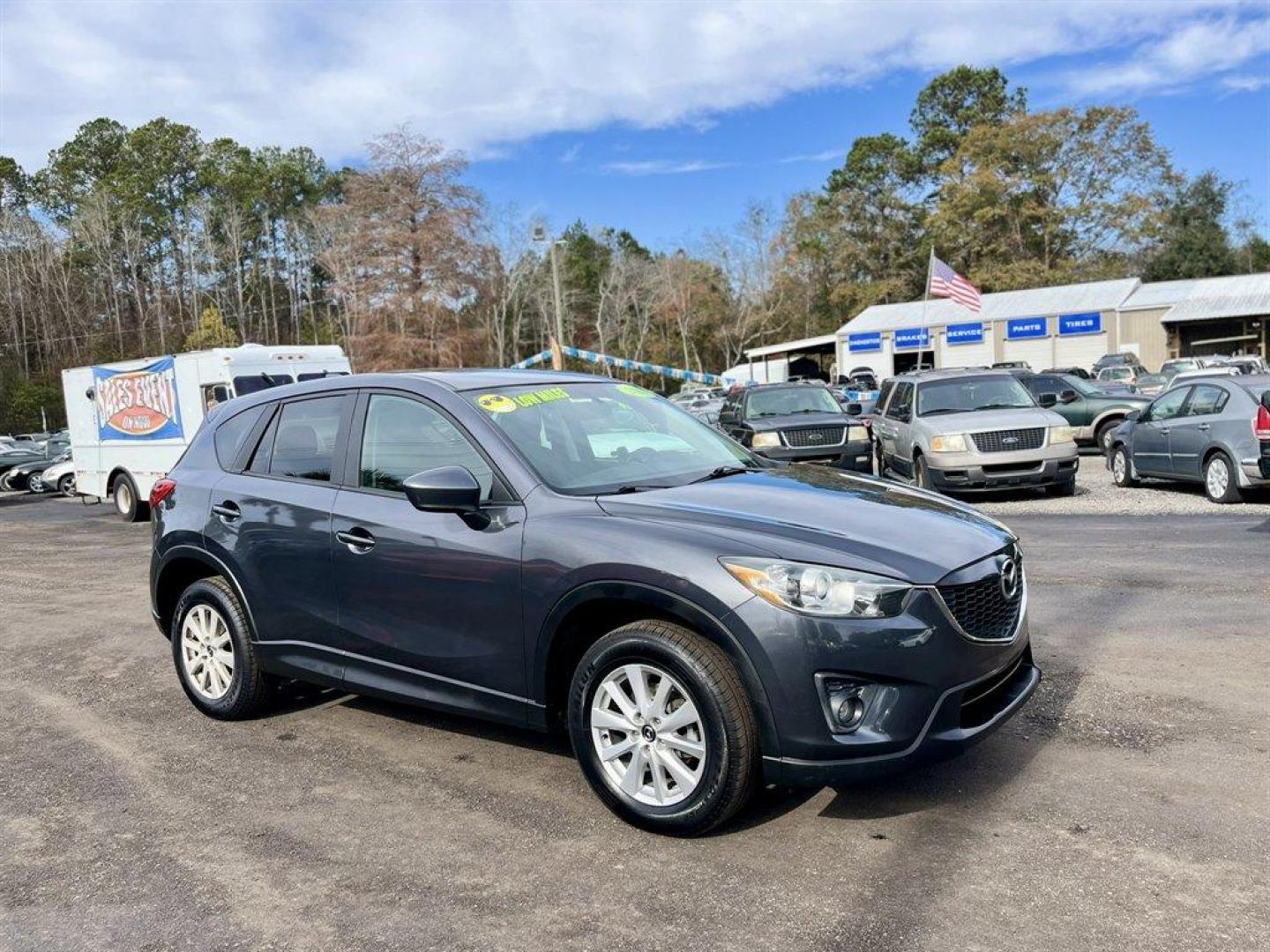 2014 Grey /Black Mazda CX-5 (JM3KE4CY6E0) with an 2.5l I-4 DI Dohc 2.5l engine, Automatic transmission, located at 745 East Steele Rd., West Columbia, SC, 29170, (803) 755-9148, 33.927212, -81.148483 - Special Internet Price! 2014 Mazda CX-5 with AM/FM radio, Bluetooth, Backup camera, Navigation, Sunroof, Manual air conditioning, Cloth interior, Powered driver seat, Keyless entry, Powered door locks, Powered windows, Plus more! - Photo#6