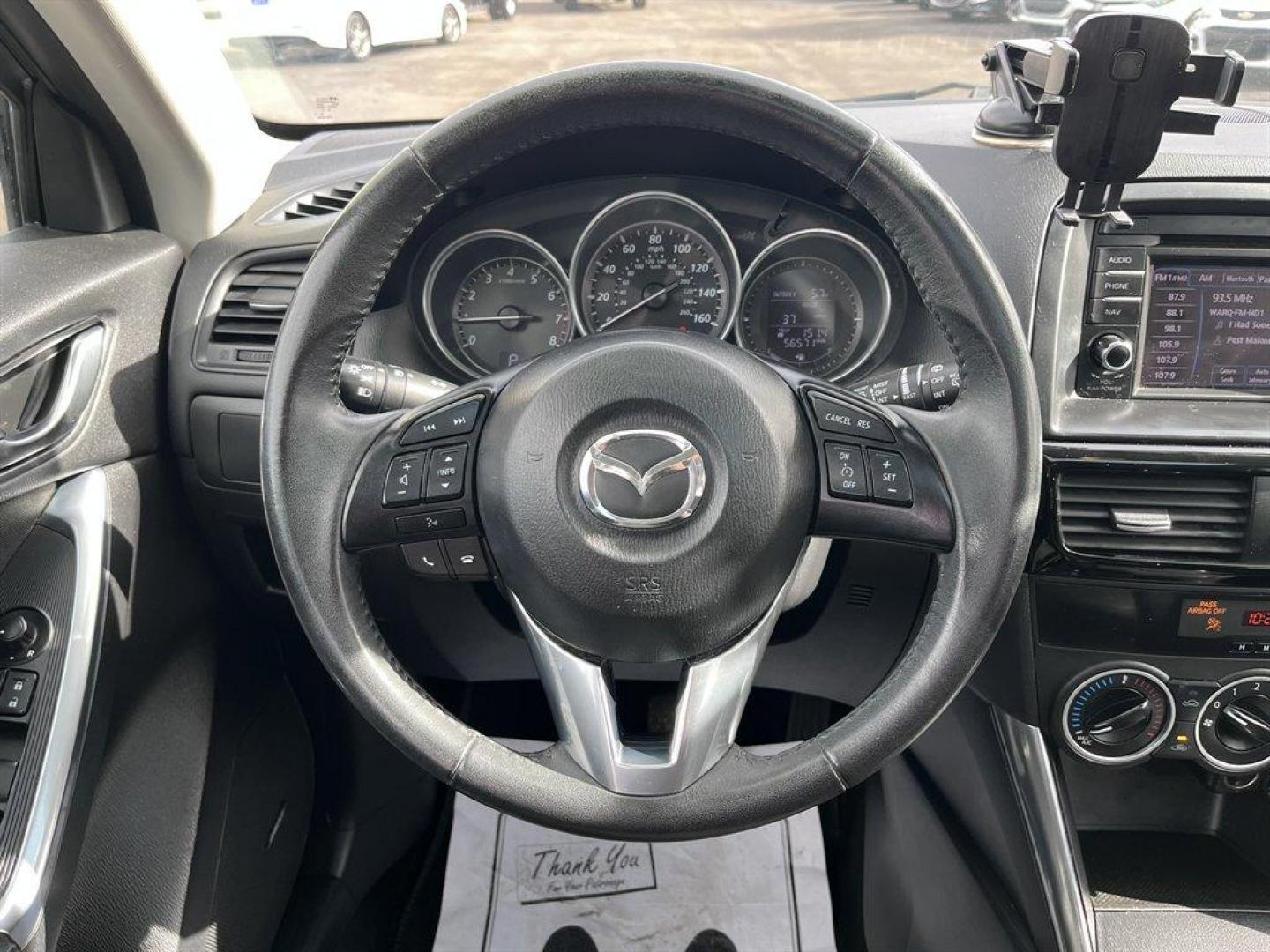 2014 Grey /Black Mazda CX-5 (JM3KE4CY6E0) with an 2.5l I-4 DI Dohc 2.5l engine, Automatic transmission, located at 745 East Steele Rd., West Columbia, SC, 29170, (803) 755-9148, 33.927212, -81.148483 - Special Internet Price! 2014 Mazda CX-5 with AM/FM radio, Bluetooth, Backup camera, Navigation, Sunroof, Manual air conditioning, Cloth interior, Powered driver seat, Keyless entry, Powered door locks, Powered windows, Plus more! - Photo#9