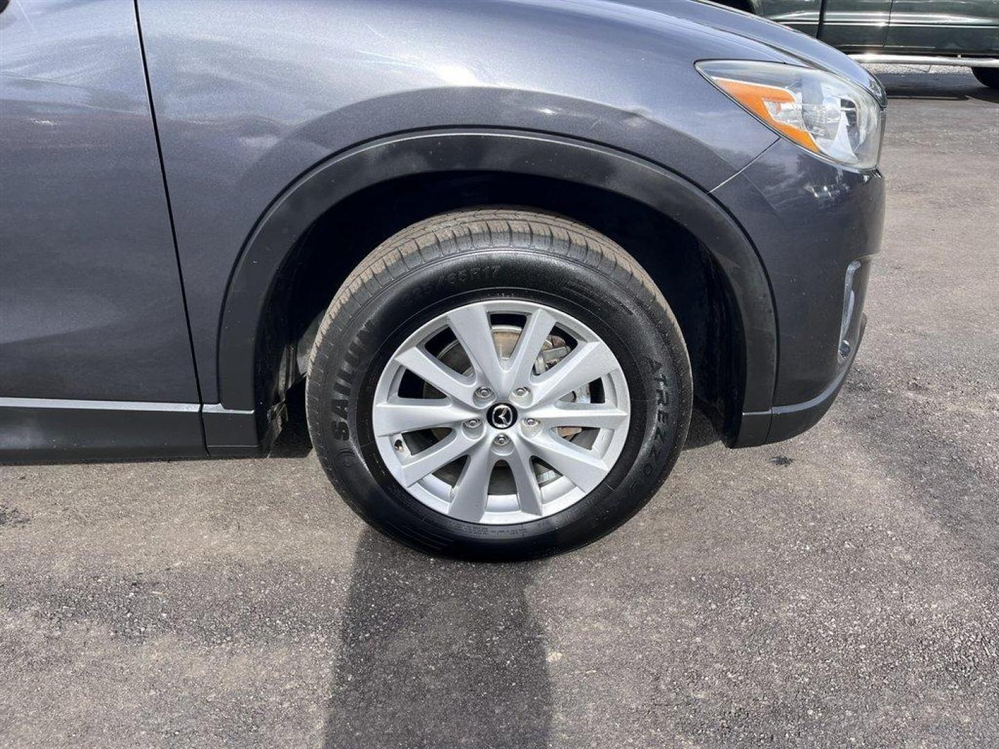 2014 Grey /Black Mazda CX-5 (JM3KE4CY6E0) with an 2.5l I-4 DI Dohc 2.5l engine, Automatic transmission, located at 745 East Steele Rd., West Columbia, SC, 29170, (803) 755-9148, 33.927212, -81.148483 - Special Internet Price! 2014 Mazda CX-5 with AM/FM radio, Bluetooth, Backup camera, Navigation, Sunroof, Manual air conditioning, Cloth interior, Powered driver seat, Keyless entry, Powered door locks, Powered windows, Plus more! - Photo#35