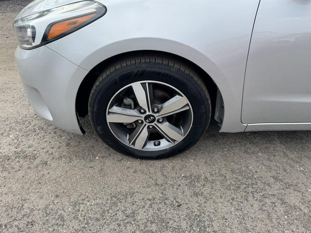 2018 Grey /Grey Kia Forte (3KPFL4A72JE) with an 2.0l I-4 MPI Dohc 2.0l engine, Automatic transmission, located at 745 East Steele Rd., West Columbia, SC, 29170, (803) 755-9148, 33.927212, -81.148483 - Photo#28