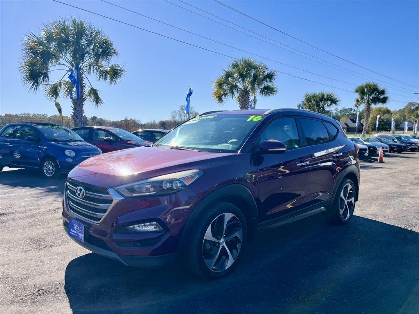 2016 Red /Tan Hyundai Tucson (KM8J3CA25GU) with an 1.6l I-4 DI Dohc Cvvt T/C engine, Automatic transmission, located at 745 East Steele Rd., West Columbia, SC, 29170, (803) 755-9148, 33.927212, -81.148483 - Special Internet Price! 2016 Hyundai Tucson with AM/FM radio, Bluetooth, Backup camera, Navigation, Cruise control, Keyless entry, Leather interior, Heated front seats, Powered front seats, Powered windows, Powered door locks, Plus more! - Photo#0