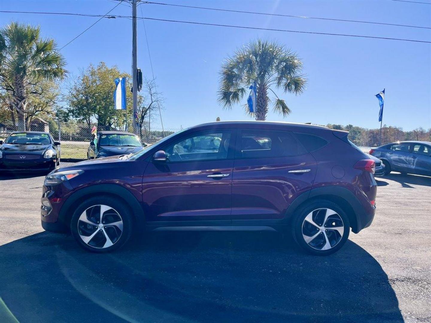 2016 Red /Tan Hyundai Tucson (KM8J3CA25GU) with an 1.6l I-4 DI Dohc Cvvt T/C engine, Automatic transmission, located at 745 East Steele Rd., West Columbia, SC, 29170, (803) 755-9148, 33.927212, -81.148483 - Special Internet Price! 2016 Hyundai Tucson with AM/FM radio, Bluetooth, Backup camera, Navigation, Cruise control, Keyless entry, Leather interior, Heated front seats, Powered front seats, Powered windows, Powered door locks, Plus more! - Photo#1