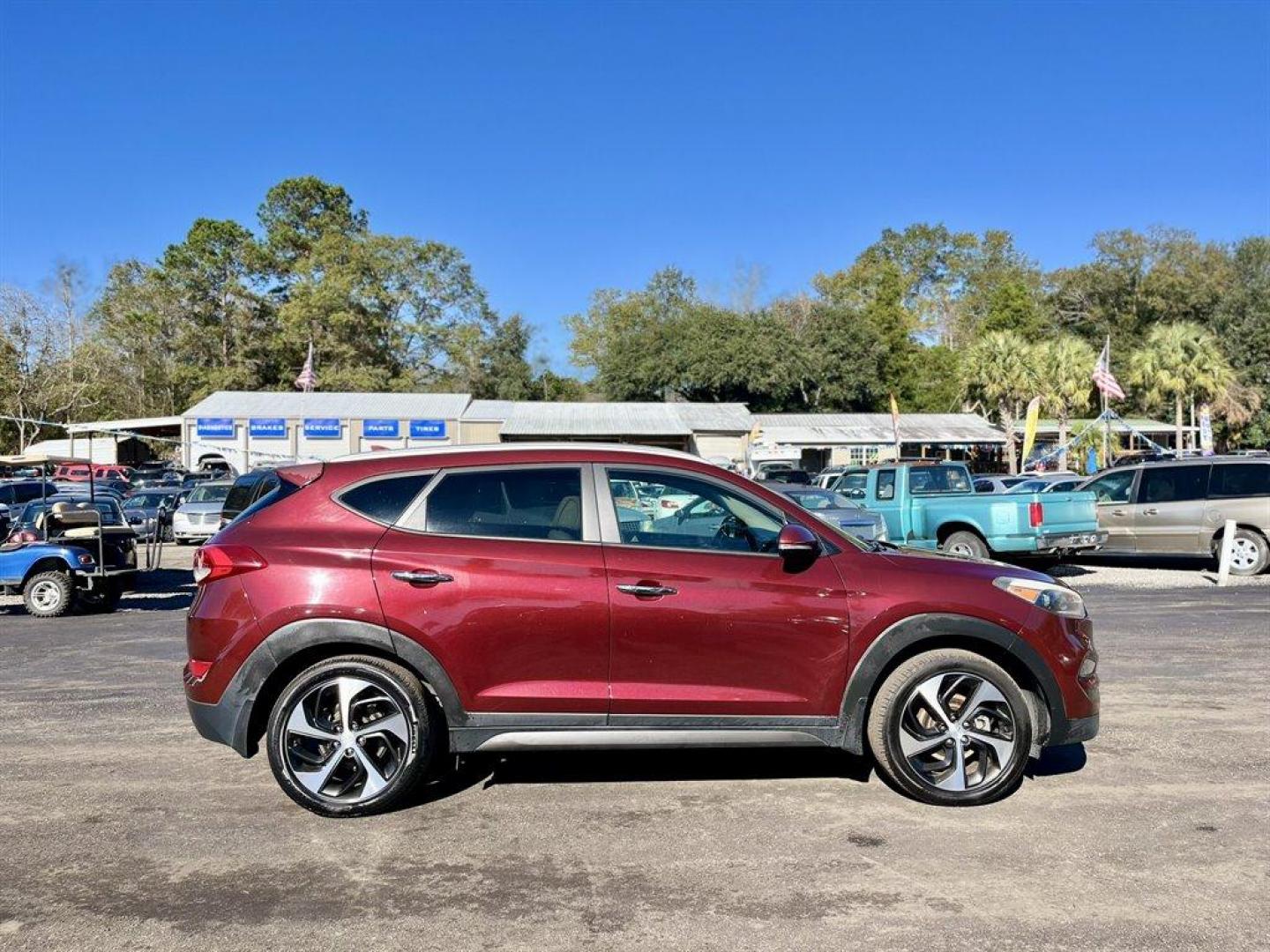 2016 Red /Tan Hyundai Tucson (KM8J3CA25GU) with an 1.6l I-4 DI Dohc Cvvt T/C engine, Automatic transmission, located at 745 East Steele Rd., West Columbia, SC, 29170, (803) 755-9148, 33.927212, -81.148483 - Special Internet Price! 2016 Hyundai Tucson with AM/FM radio, Bluetooth, Backup camera, Navigation, Cruise control, Keyless entry, Leather interior, Heated front seats, Powered front seats, Powered windows, Powered door locks, Plus more! - Photo#5