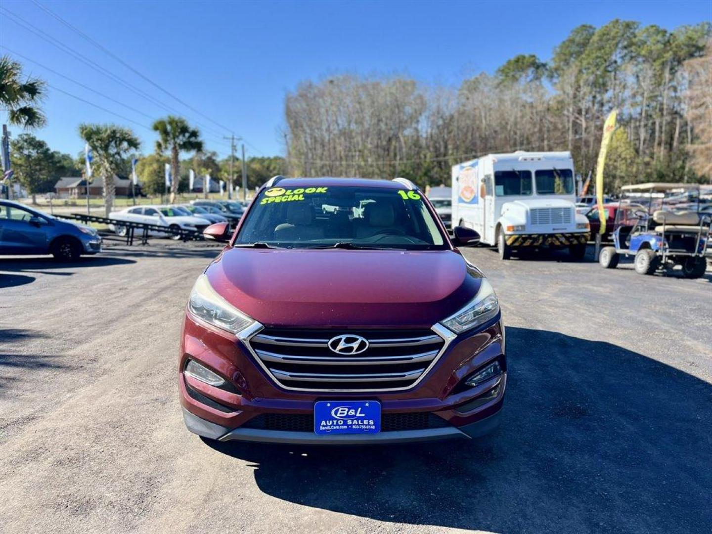 2016 Red /Tan Hyundai Tucson (KM8J3CA25GU) with an 1.6l I-4 DI Dohc Cvvt T/C engine, Automatic transmission, located at 745 East Steele Rd., West Columbia, SC, 29170, (803) 755-9148, 33.927212, -81.148483 - Special Internet Price! 2016 Hyundai Tucson with AM/FM radio, Bluetooth, Backup camera, Navigation, Cruise control, Keyless entry, Leather interior, Heated front seats, Powered front seats, Powered windows, Powered door locks, Plus more! - Photo#7