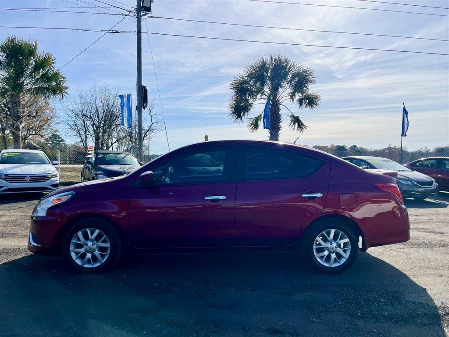 2017 Red /Black Nissan Versa (3N1CN7AP3HL) with an 1.6l I-4 Smpi Dohc Cvtcs engine, Automatic transmission, located at 745 East Steele Rd., West Columbia, SC, 29170, (803) 755-9148, 33.927212, -81.148483 - Special Internet Price! 2017 Nissan Versa with AM/FM radio, Bluetooth, Backup camera, Cruise control, Keyless entry, Cloth interior, Powered windows, Powered door locks, Plus more! - Photo#1