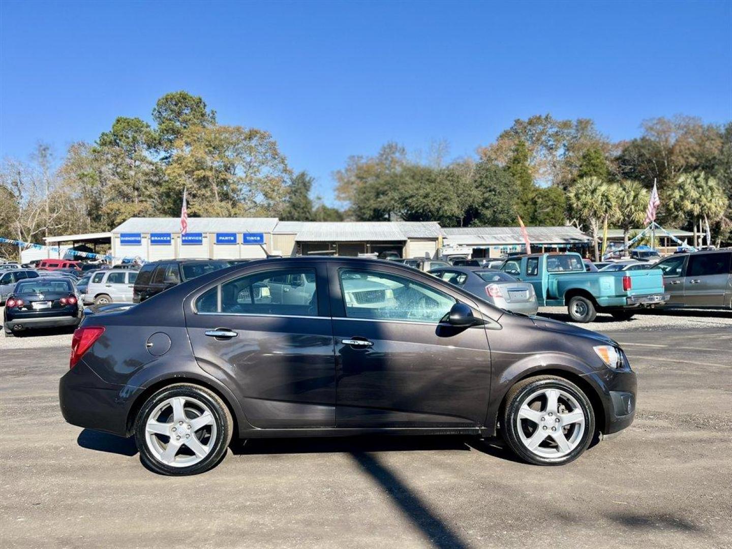 2014 Brown /Black Chevrolet Sonic (1G1JE5SH6E4) with an 1.8l I-4 MFI Dohc Flex 1. engine, Automatic transmission, located at 745 East Steele Rd., West Columbia, SC, 29170, (803) 755-9148, 33.927212, -81.148483 - Special Internet Price! 2014 Chevrolet Sonic with AM/FM radio, Cruise control, Manual air conditioning, Backup camera, Powered windows, Powered door locks, Plus more! - Photo#5