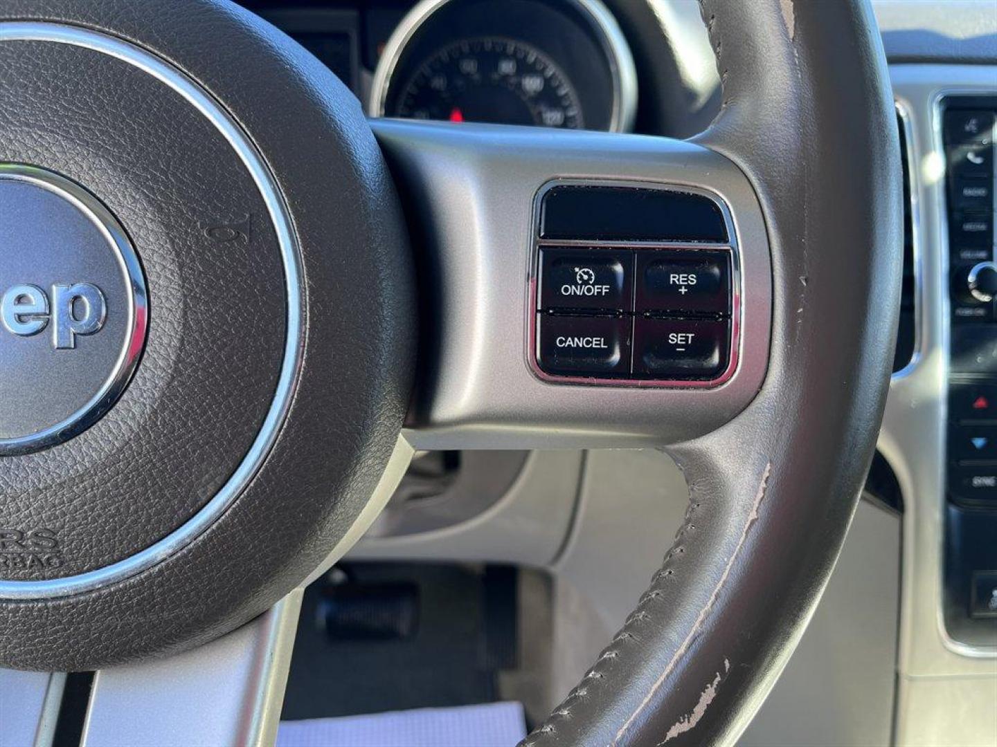 2011 Silver /Taupe Jeep Grand Cherokee (1J4RS4GG1BC) with an 3.6l V6 MPI Dohc VVT Flex engine, Automatic transmission, located at 745 East Steele Rd., West Columbia, SC, 29170, (803) 755-9148, 33.927212, -81.148483 - Special Internet Price! 2011 Jeep Grand Cherokee with AM/FM radio, Backup camera, Cruise control, Panoramic sunroof, Leather interior, Heated seats, Powered windows, Powered door locks, Plus more! - Photo#9