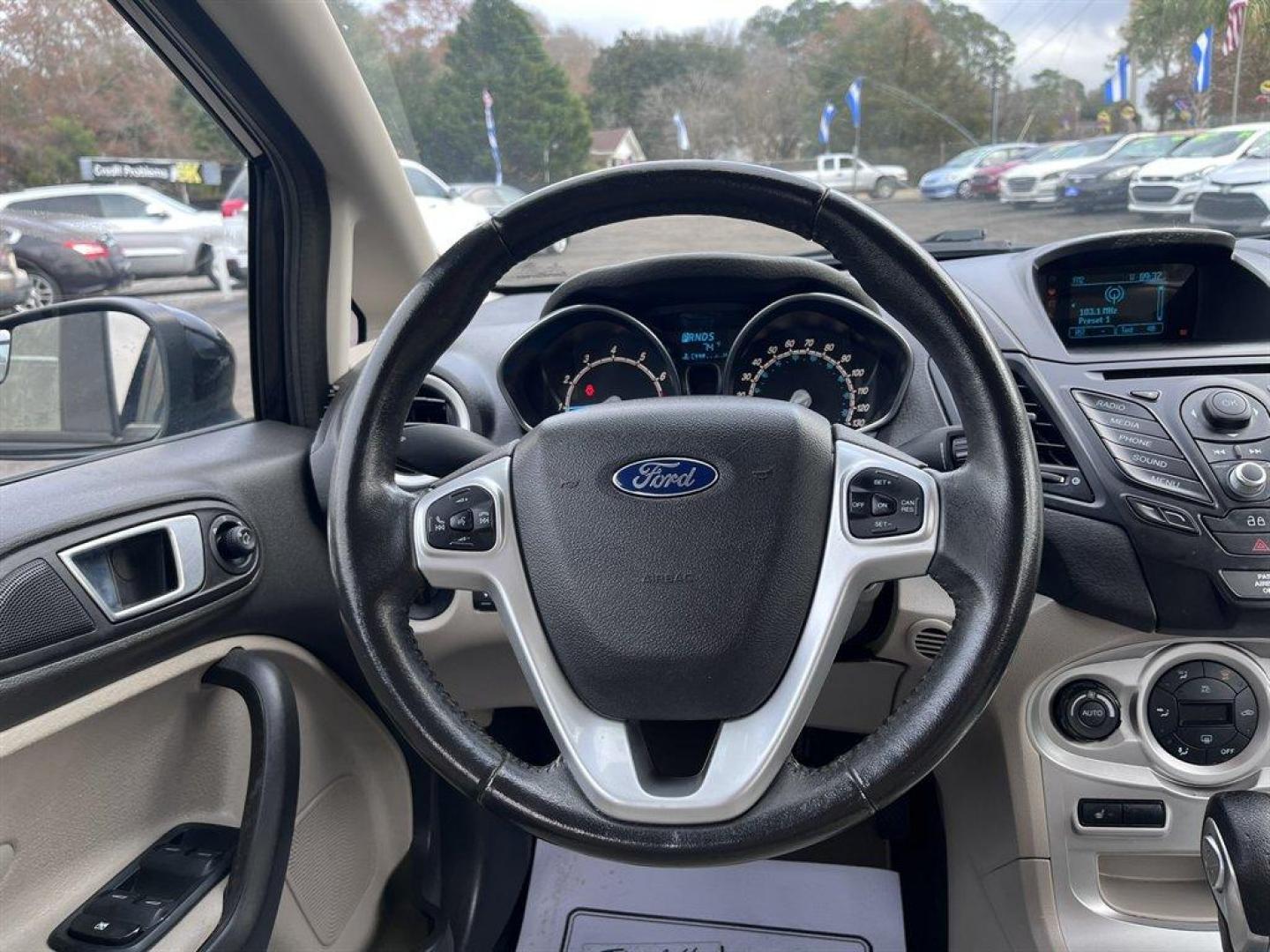 2014 Black /Grey Ford Fiesta (3FADP4BJ1EM) with an 1.6l I-4 Smpi Dohc 1.6l engine, Automatic transmission, located at 745 East Steele Rd., West Columbia, SC, 29170, (803) 755-9148, 33.927212, -81.148483 - Special Internet Price! 2014 Ford Fiesta SE with AM/FM radio, Cruise control, Keyless entry, Cloth interior, Powered windows, Powered door locks, Plus more! - Photo#9