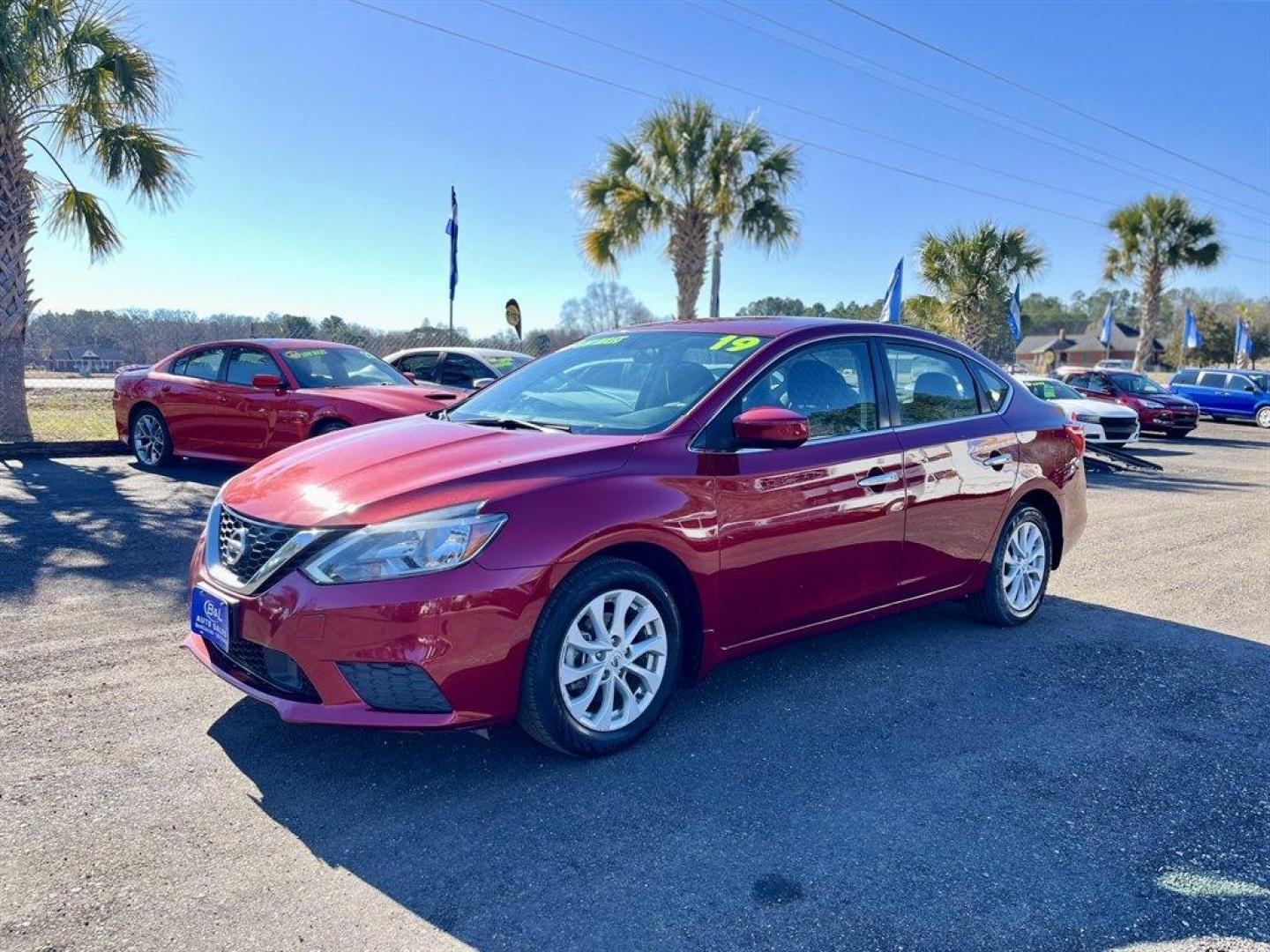 2019 Red /Black Nissan Sentra (3N1AB7AP8KY) with an 1.8l I-4 Smpi Dohc 1.8l engine, Automatic transmission, located at 745 East Steele Rd., West Columbia, SC, 29170, (803) 755-9148, 33.927212, -81.148483 - Special Internet Price! 2019 Nissan Sentra with AM/FM radio, Bluetooth, Backup camera, Cruise control, Cloth interior, Powered windows, Powered door locks, Plus more! - Photo#0