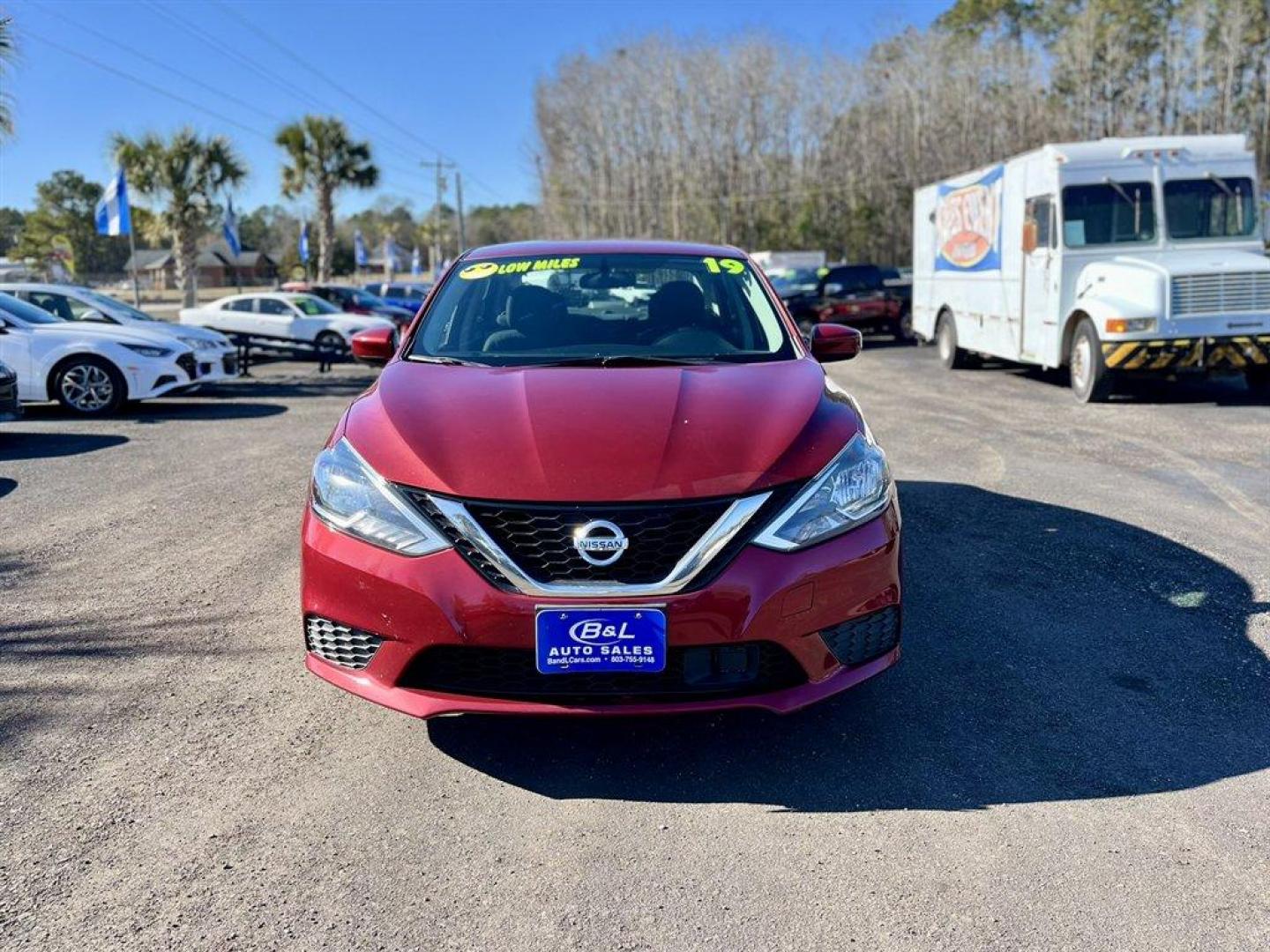 2019 Red /Black Nissan Sentra (3N1AB7AP8KY) with an 1.8l I-4 Smpi Dohc 1.8l engine, Automatic transmission, located at 745 East Steele Rd., West Columbia, SC, 29170, (803) 755-9148, 33.927212, -81.148483 - Special Internet Price! 2019 Nissan Sentra with AM/FM radio, Bluetooth, Backup camera, Cruise control, Cloth interior, Powered windows, Powered door locks, Plus more! - Photo#1