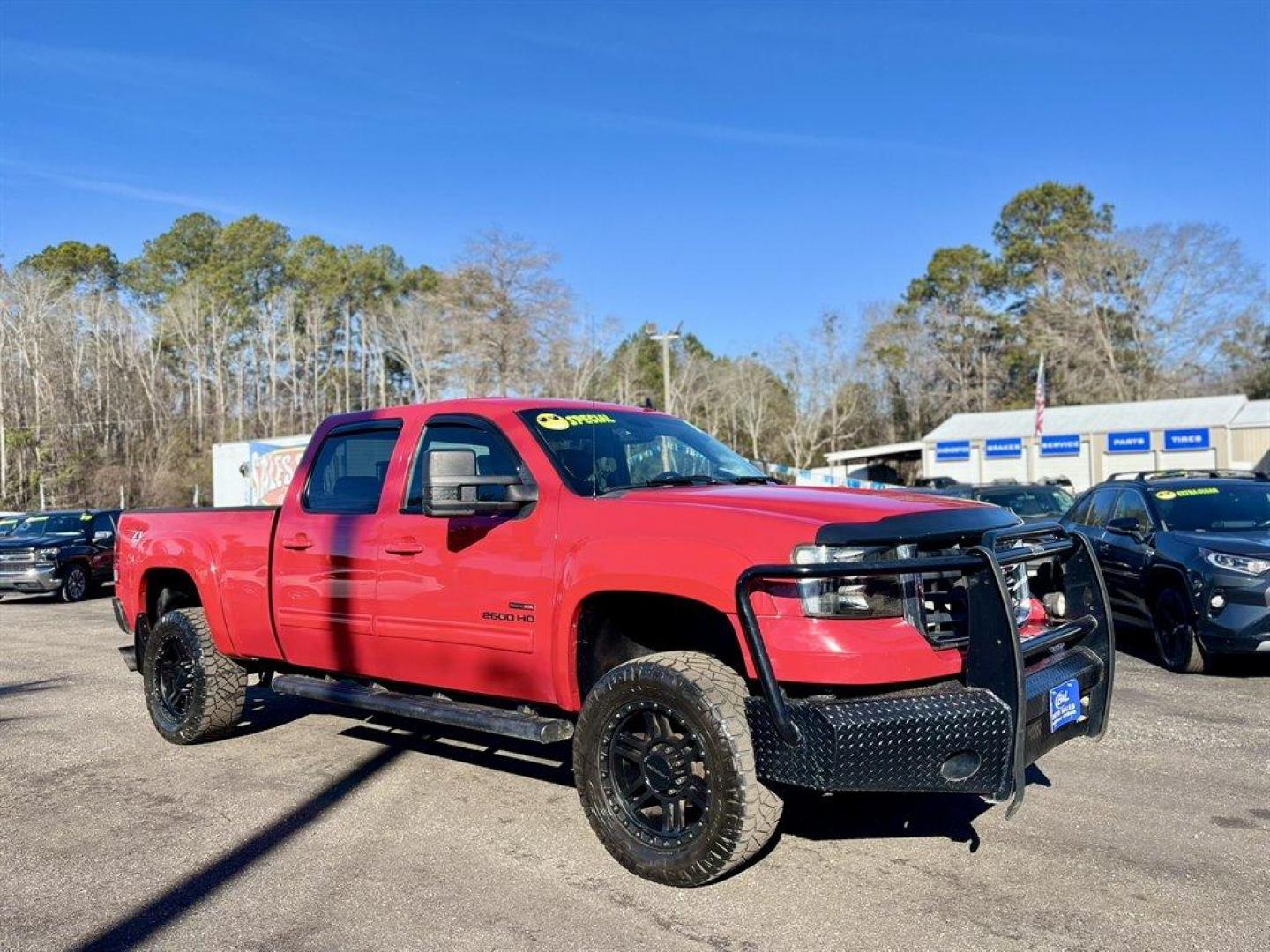 2010 Red /Black GMC Sierra 2500 (1GT4K1B64AF) with an 6.6l V8 DI DSL T/C 6.6l engine, Automatic transmission, located at 745 East Steele Rd., West Columbia, SC, 29170, (803) 755-9148, 33.927212, -81.148483 - Special Internet Price! 2010 GMC Sierra 2500 with AM/FM radio, Cruise control, Manual air conditioning, Sunroof, Leather interior, Powered front seats, Powered windows, Powered door locks, 4X4, Plus more! - Photo#2