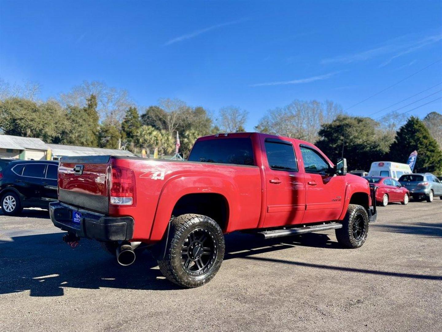 2010 Red /Black GMC Sierra 2500 (1GT4K1B64AF) with an 6.6l V8 DI DSL T/C 6.6l engine, Automatic transmission, located at 745 East Steele Rd., West Columbia, SC, 29170, (803) 755-9148, 33.927212, -81.148483 - Special Internet Price! 2010 GMC Sierra 2500 with AM/FM radio, Cruise control, Manual air conditioning, Sunroof, Leather interior, Powered front seats, Powered windows, Powered door locks, 4X4, Plus more! - Photo#3